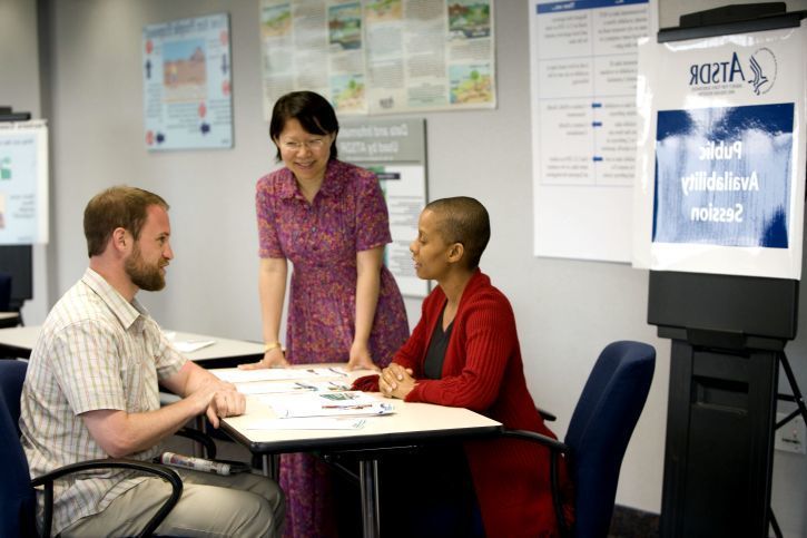 Large large african american and asian american woman with caucasian man in office working 725x483