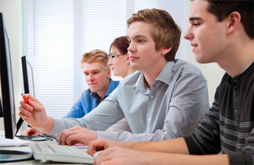 Large 141223419 students in a computer classroom 500px